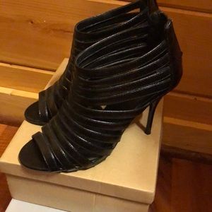 Zip up black high heels